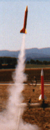A rocket lifting off powered by one D12-5 and two A10-3T’s