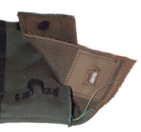 One side of the flap is placed over the matching loop